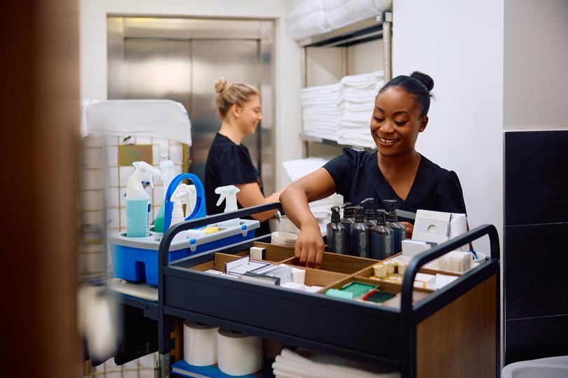 Commercial cleaners cleaning an office space